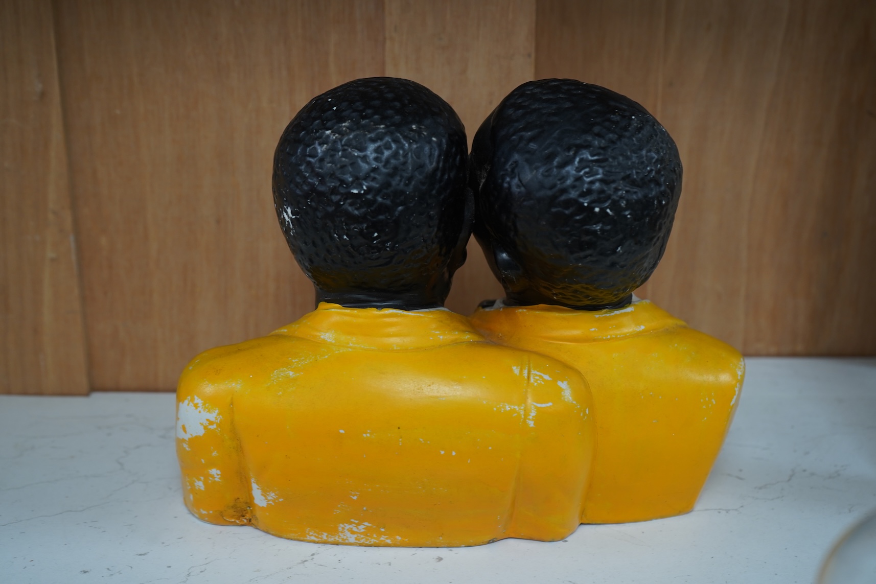 A 20th century Americana ceramic figure group of two jazz singers, 25cm wide